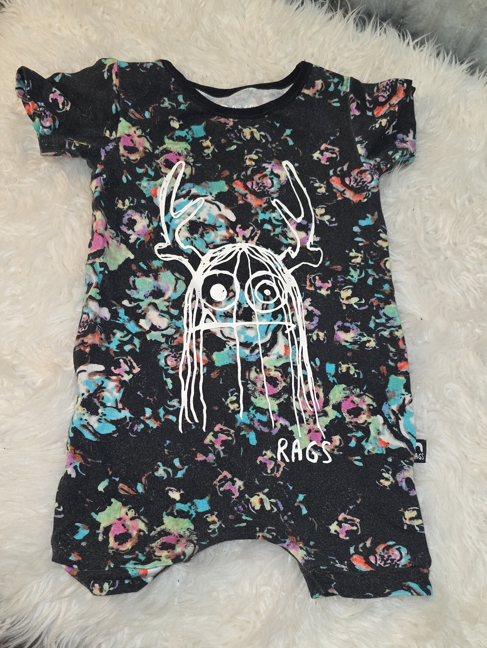 Rags to Raches Black Floral Graphic Romper with White Print